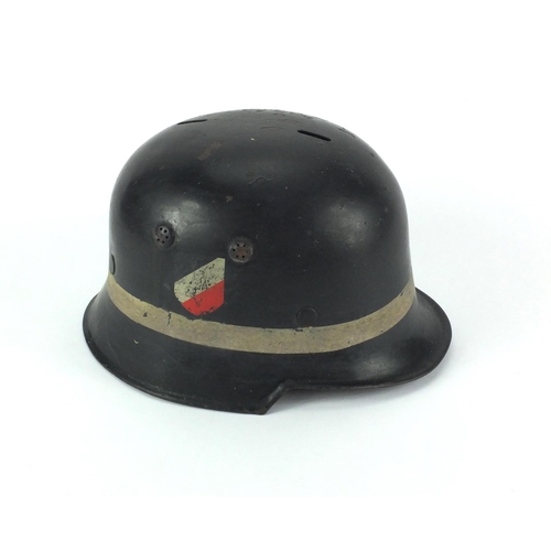 292 - German Military interest Luftwaffe fireman's helmet with decals and stamp to the interior