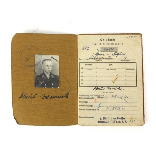 296 - German Military interest soldiers personnel pass book with ink inscriptions and photograph