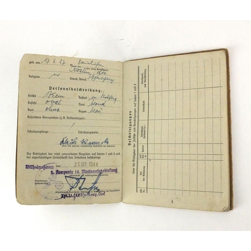 296 - German Military interest soldiers personnel pass book with ink inscriptions and photograph