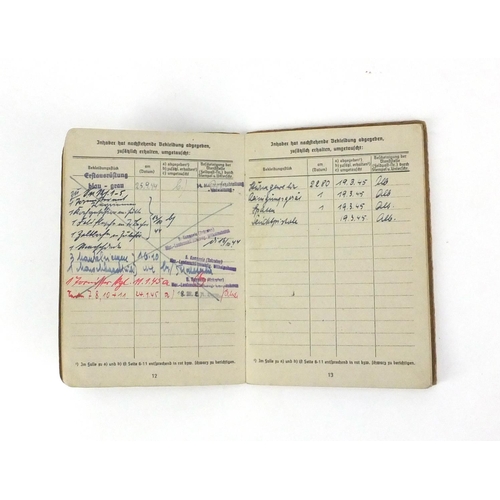 296 - German Military interest soldiers personnel pass book with ink inscriptions and photograph