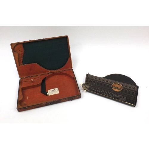 237 - 19th century rosewood and ivory zither by Anton Kiendl, with floral chased mounts and fitted case, l... 