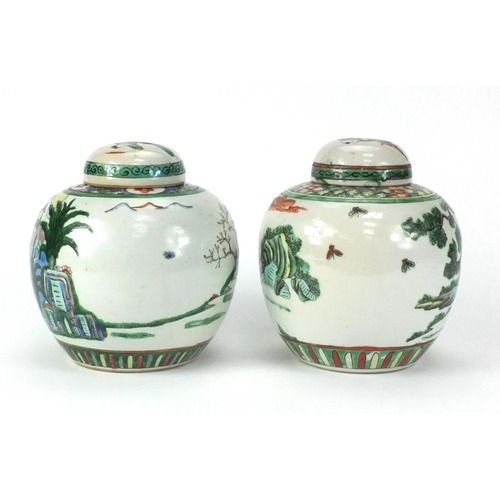 475 - Two Chinese porcelain ginger jar and covers, each hand painted in the famille verte palette with fig... 