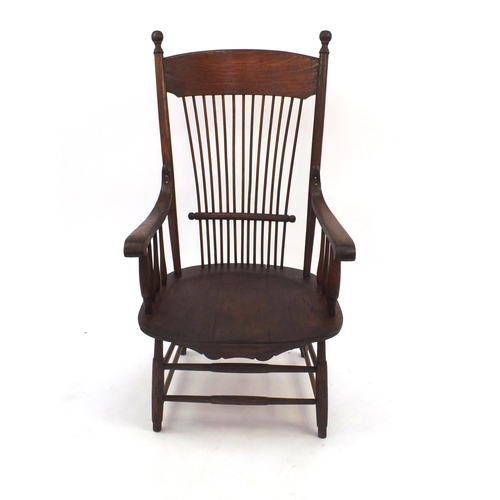 2046 - Arts & Crafts oak spindle back chair, 101cm high