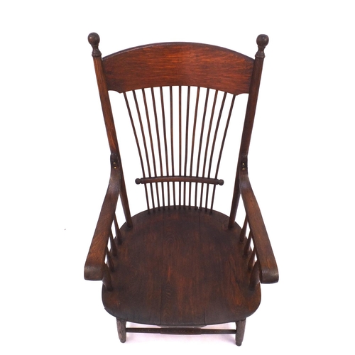 2046 - Arts & Crafts oak spindle back chair, 101cm high