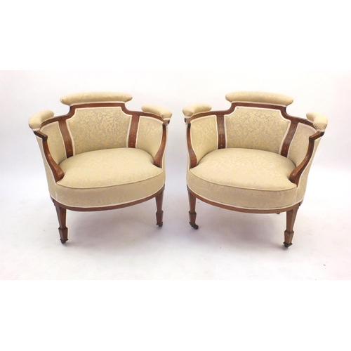 2030 - Pair of Edwardian inlaid rosewood tub chairs with panel upholstered backs and upholstered stuff over... 