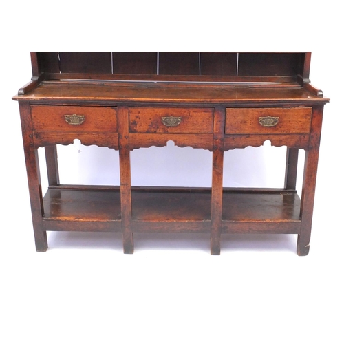 2008 - 18th Century oak dresser with three plate shelves above three drawers and pot board base, 187cm high... 