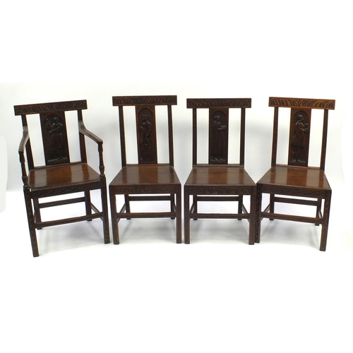 2044 - Four Victorian oak chairs to include a carver, the slats carved with figures, each 92cm high