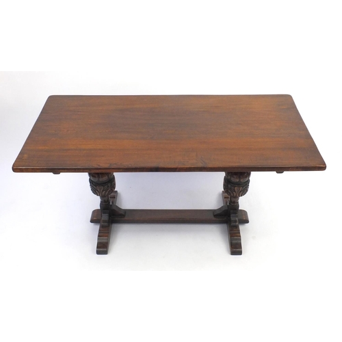 2043 - Oak refectory table with rectangular top, carved bulbous 
legs, 76cm high x 152cm wide x 75cm deep