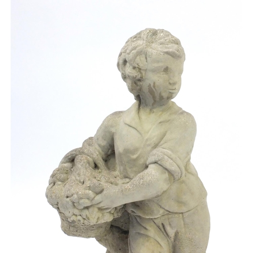 2108 - Pair of garden stoneware figures, one of a young boy carrying a basket the other of a young girl hol... 