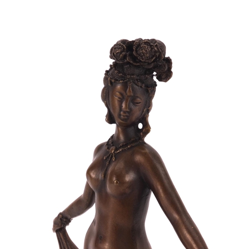 2304 - Bronze study of a nude Geisha girl standing on a shell, 27cm high