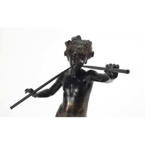 2166 - Bronze study of a nude young male musician, raised on a circular faux marble base, overall 39cm high