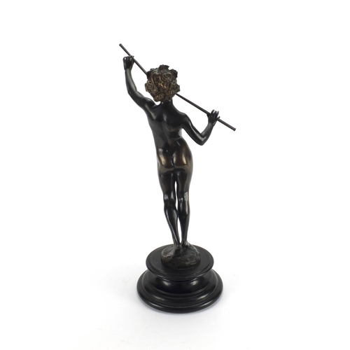 2166 - Bronze study of a nude young male musician, raised on a circular faux marble base, overall 39cm high