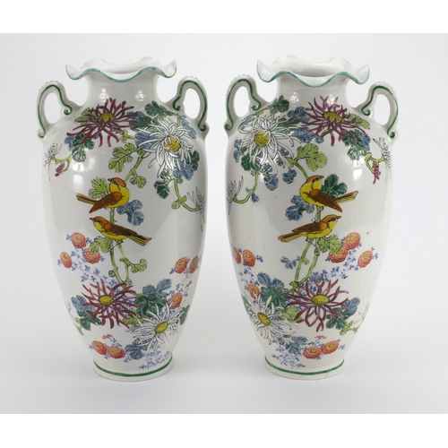 2218 - Large pair of Royal Nippon vases both with twin handles, hand painted with birds amongst flowers, fa... 