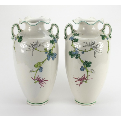 2218 - Large pair of Royal Nippon vases both with twin handles, hand painted with birds amongst flowers, fa... 