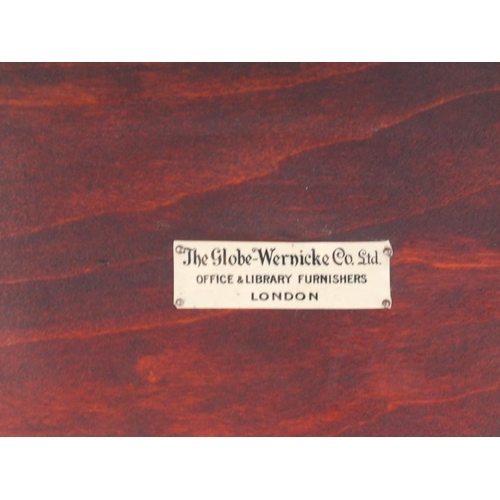 2002 - Globe Wernicke  mahogany four section book case, labels to the interior, 143cm high x 87cm wide x 28... 