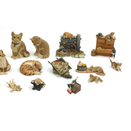 2190 - Sherrat & Simpson cats including on a chest of drawers and in a wheelbarrow, the largest 18cm high