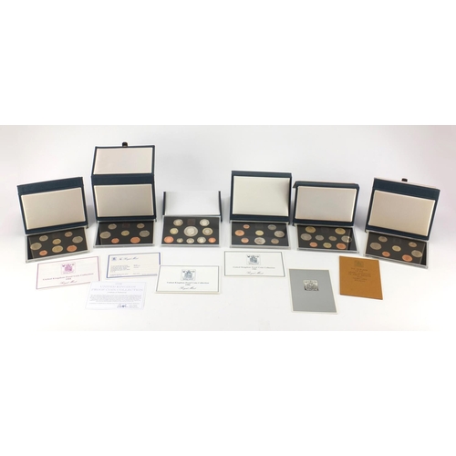 2554 - Six United Kingdom proof coin collections by The Royal Mint including dates 1984, 1985, 1986, 1988 a... 