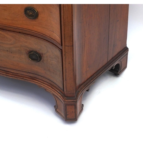 2001 - Georgian mahogany serpentine fronted chest fitted with four graduated drawers with canted corners on... 