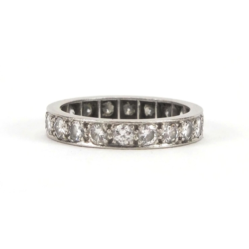 915 - Platinum and diamond eternity ring set with twenty diamonds, size M, approximate weight 4.0g