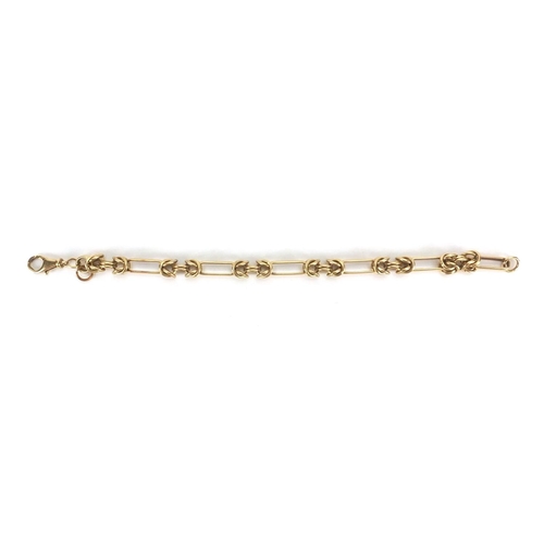 911 - Stylish unmarked gold multi link bracelet, 22cm long,  approximate weight 28.5g