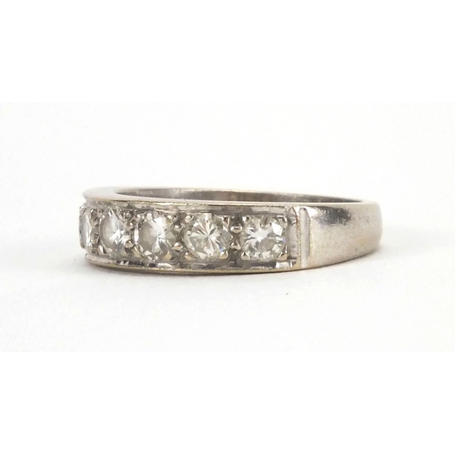 905 - 18ct white gold diamond half eternity ring set with seven diamonds, size O, approximate weight 6.0g