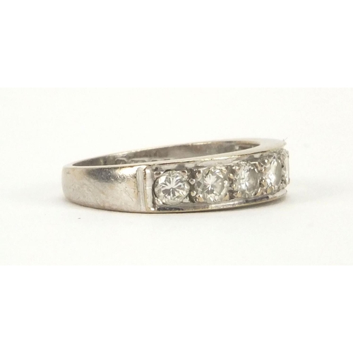 905 - 18ct white gold diamond half eternity ring set with seven diamonds, size O, approximate weight 6.0g