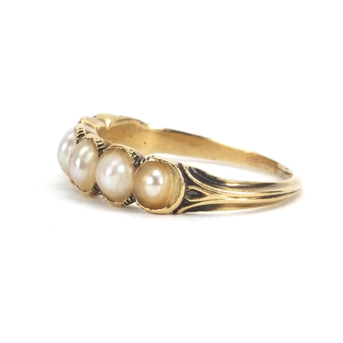 934 - Unmarked gold pearl ring, set with six pearls, size M, approximate weight 2.4g