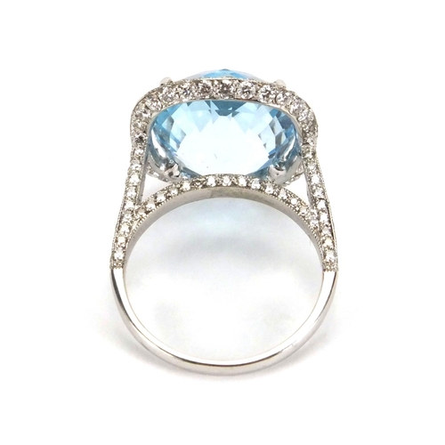 940 - Platinum blue topaz and diamond ring, size L, approximate weight 7.0g