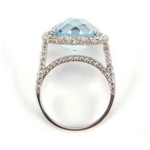 940 - Platinum blue topaz and diamond ring, size L, approximate weight 7.0g