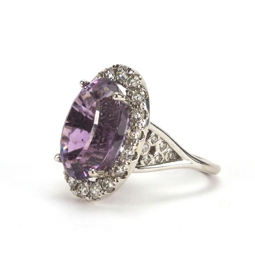 912 - 18ct white gold amethyst and diamond cocktail ring, size N, approximate weight 12.7g