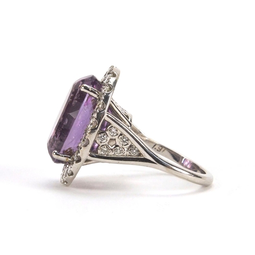 912 - 18ct white gold amethyst and diamond cocktail ring, size N, approximate weight 12.7g