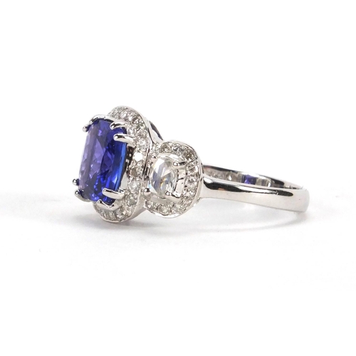 922 - 18ct white gold tanzanite and diamond ring, size N, approximate weight 4.4g