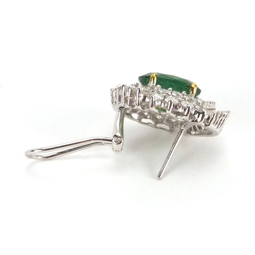 897 - Pair of 18ct white gold emerald and diamond earrings, 2cm long, approximate weight 12.4g