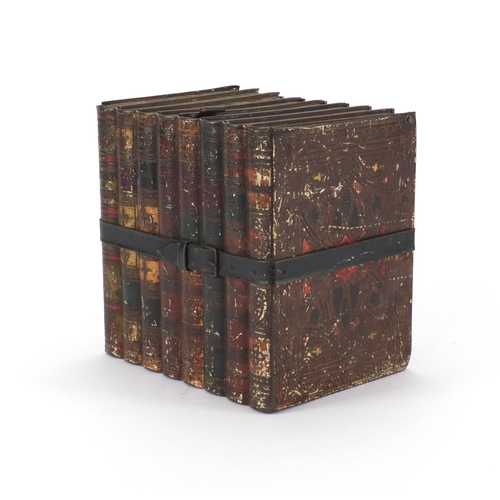 60 - Huntley & Palmers biscuit tin in the form of eight stacked books, 17cm high
