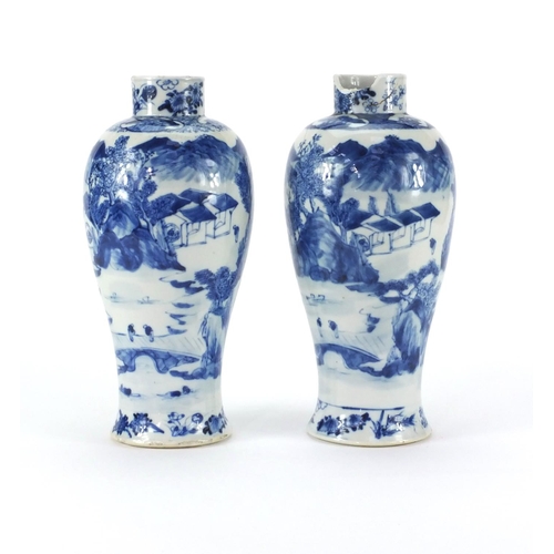 493 - Pair of Chinese blue and white baluster vases, both hand painted with figures and a river landscape,... 