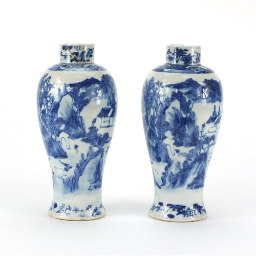 493 - Pair of Chinese blue and white baluster vases, both hand painted with figures and a river landscape,... 