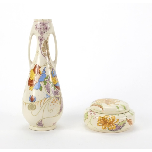 774 - Ivora Gouda vase with twin handles and pot and cover, both hand painted with stylised flowers, each ... 