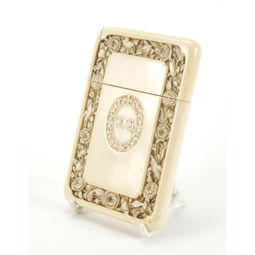 545 - Chinese Canton ivory card case, carved with flowers, 11.5cm high x 7.5cm wide x 1.4cm deep