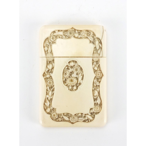 545 - Chinese Canton ivory card case, carved with flowers, 11.5cm high x 7.5cm wide x 1.4cm deep