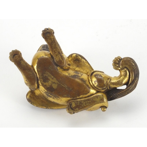 567 - Chinese gilt bronze study of a mythical creature, 8.5cm in length