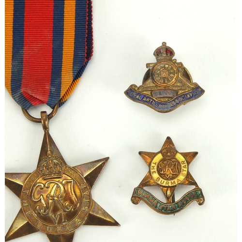 264 - British Military George VI and later medals with two badges, the Territorial Efficient Service medal... 