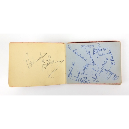 161 - 1950's/1960's good autograph album containing ink signatures, some sporting, including  Laurel and H... 