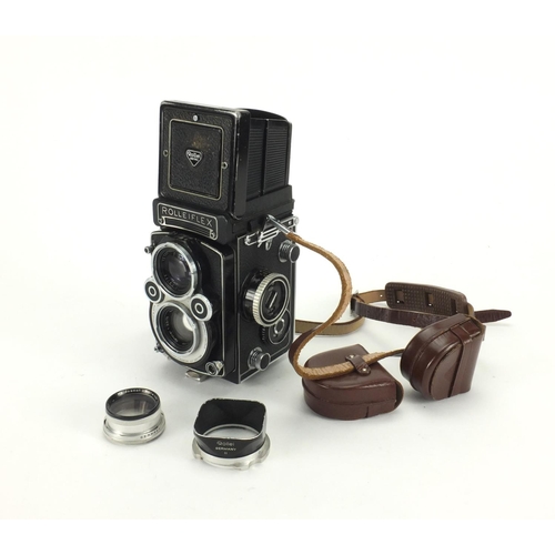 131 - Rolleiflex 35F camera model E with Schnider lense,  75mm Reolleiflex hood and synchro-compur shutter... 