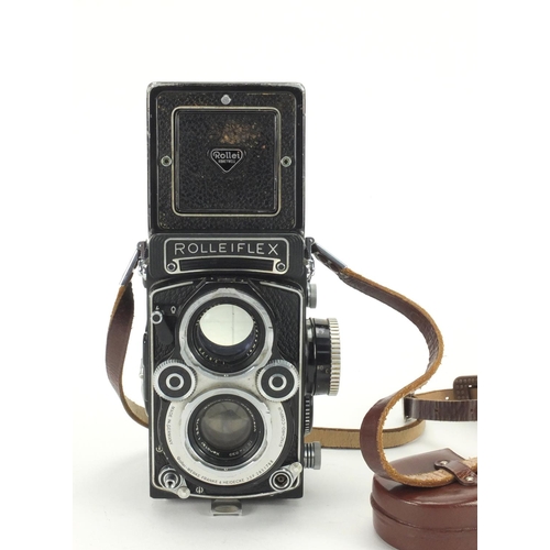 131 - Rolleiflex 35F camera model E with Schnider lense,  75mm Reolleiflex hood and synchro-compur shutter... 