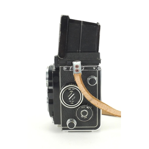 131 - Rolleiflex 35F camera model E with Schnider lense,  75mm Reolleiflex hood and synchro-compur shutter... 