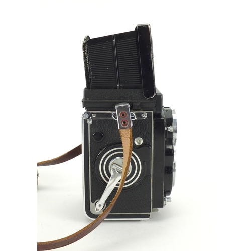 131 - Rolleiflex 35F camera model E with Schnider lense,  75mm Reolleiflex hood and synchro-compur shutter... 