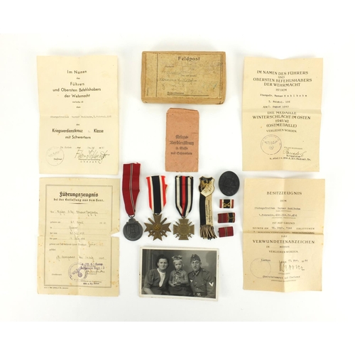 279 - German Military medals and badges relating to OBERGEFREITEN WERNER HAHLBOHM including wounds badge a... 