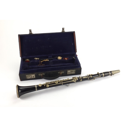 234 - Boosey and Hawkes four piece wooden clarinet with velvet lined fitted carrying case, each piece numb... 