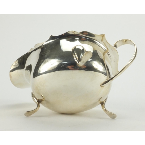 831 - Silver three footed sauce boat, E.V Sheffield 1936, 19cm long, approximate weight 203.0g