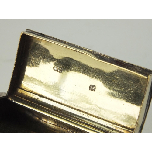 822 - Rectangular Georgian silver snuff box with hinged lid and engraved decoration, A.K London 1803, 7cm ... 